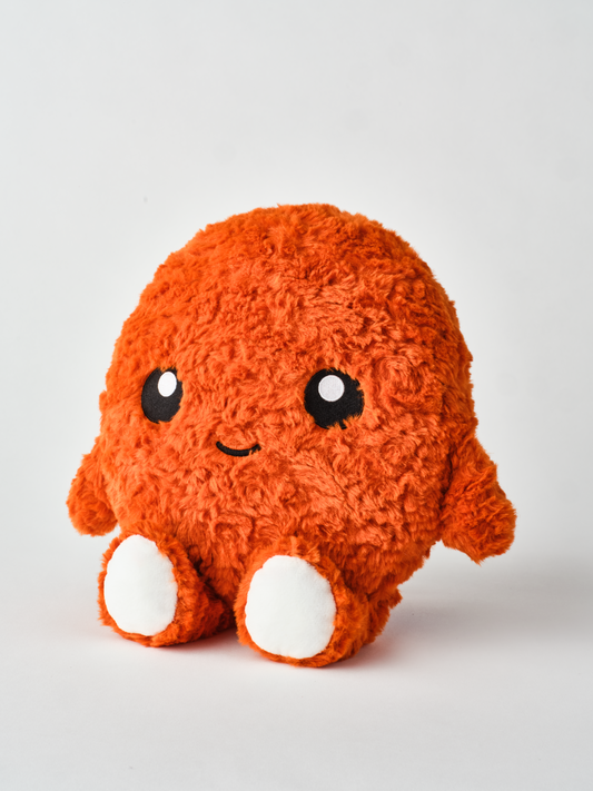 Adorable chicken nugget plush toy with a happy face, soft orange fuzzy texture, and round white feet, shown from a side angle on a white background โ perfect cuddly gift for kids and plush collectors.